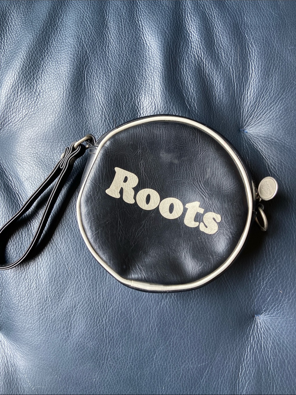 Roots Canada Vintage Cooper Beaver Black Round Wristlet with Cream Logo